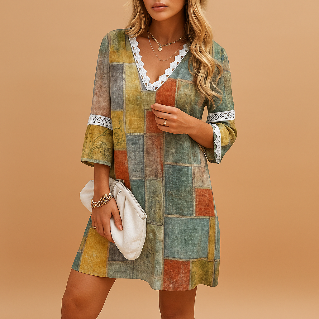 Dames zomerjurk met korte mouwen en vrolijke prints, perfect voor zonnige dagen en casual gelegenheden