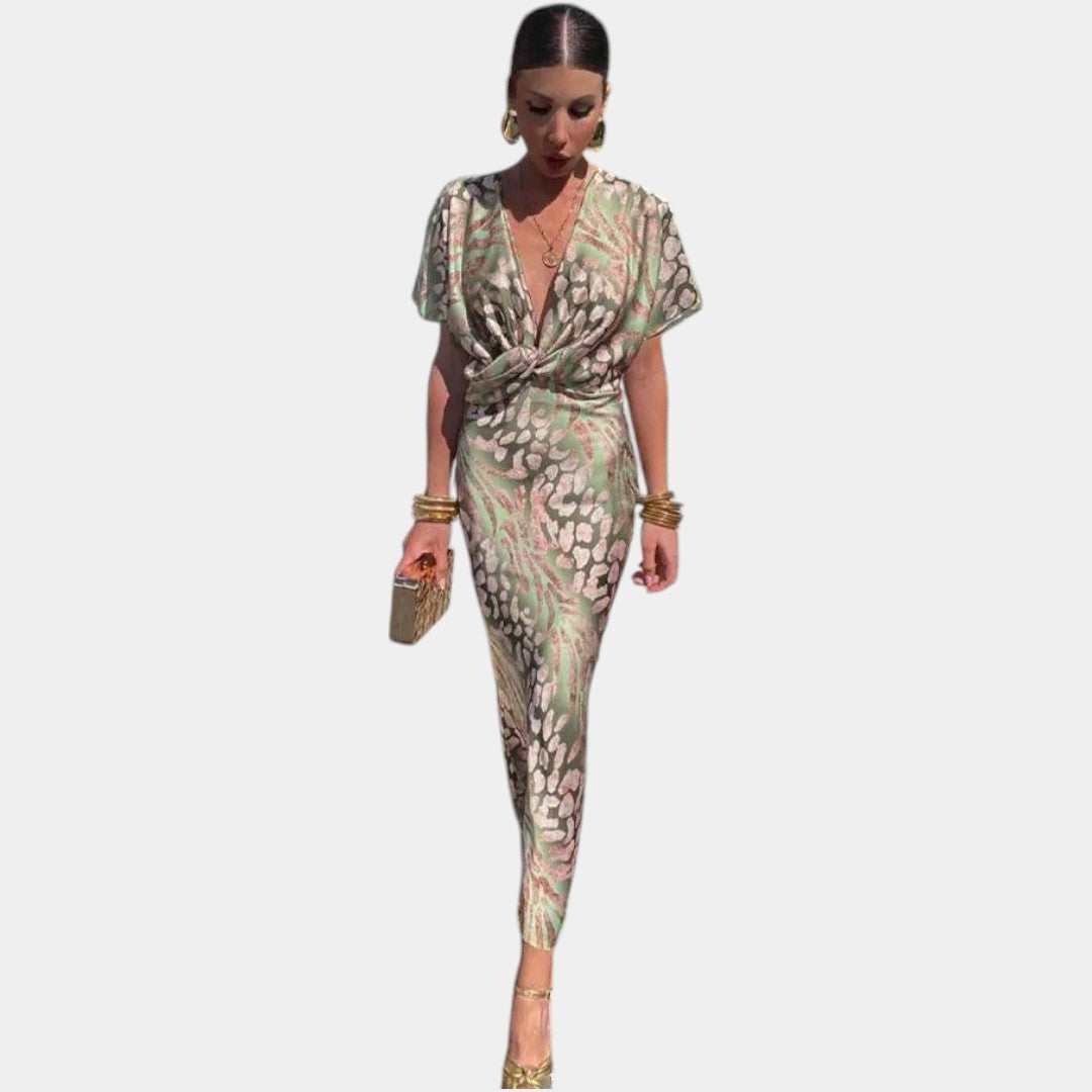 Dames bloemenjurk met V-hals, korte mouwen en plissérok – perfect voor zowel casual als formele momenten in lente en zomer.