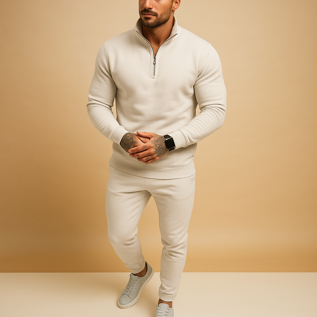 Joggingpak voor heren met halve rits trui en joggingbroek, beschikbaar in zwart, grijs, wit en khaki – ideaal voor thuis of onderweg.