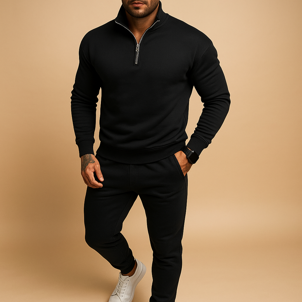 Joggingpak voor heren met halve rits trui en joggingbroek, beschikbaar in zwart, grijs, wit en khaki – ideaal voor thuis of onderweg.