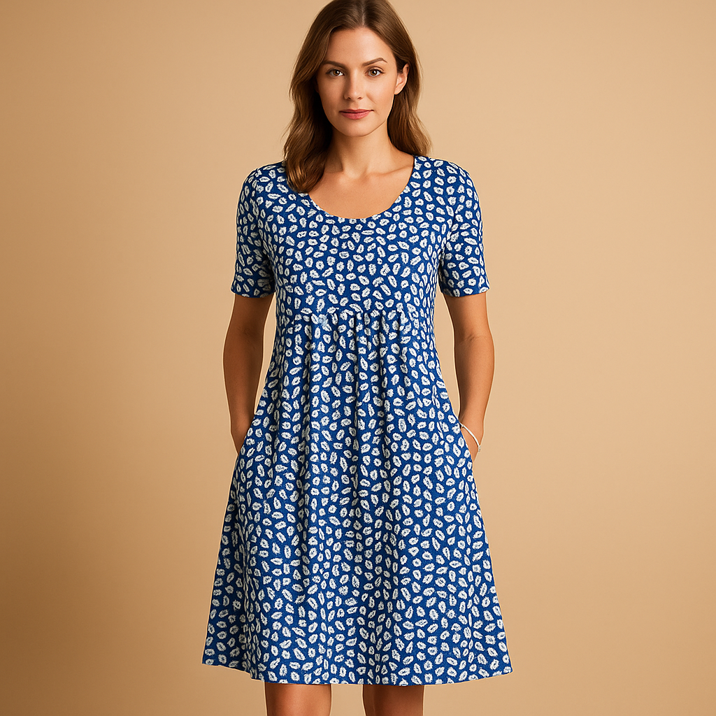 Luchtige katoenen midi-jurk met zomerse prints voor dames, licht getailleerde pasvorm en speels ontwerp, ideaal voor warme dagen en vakanties.
