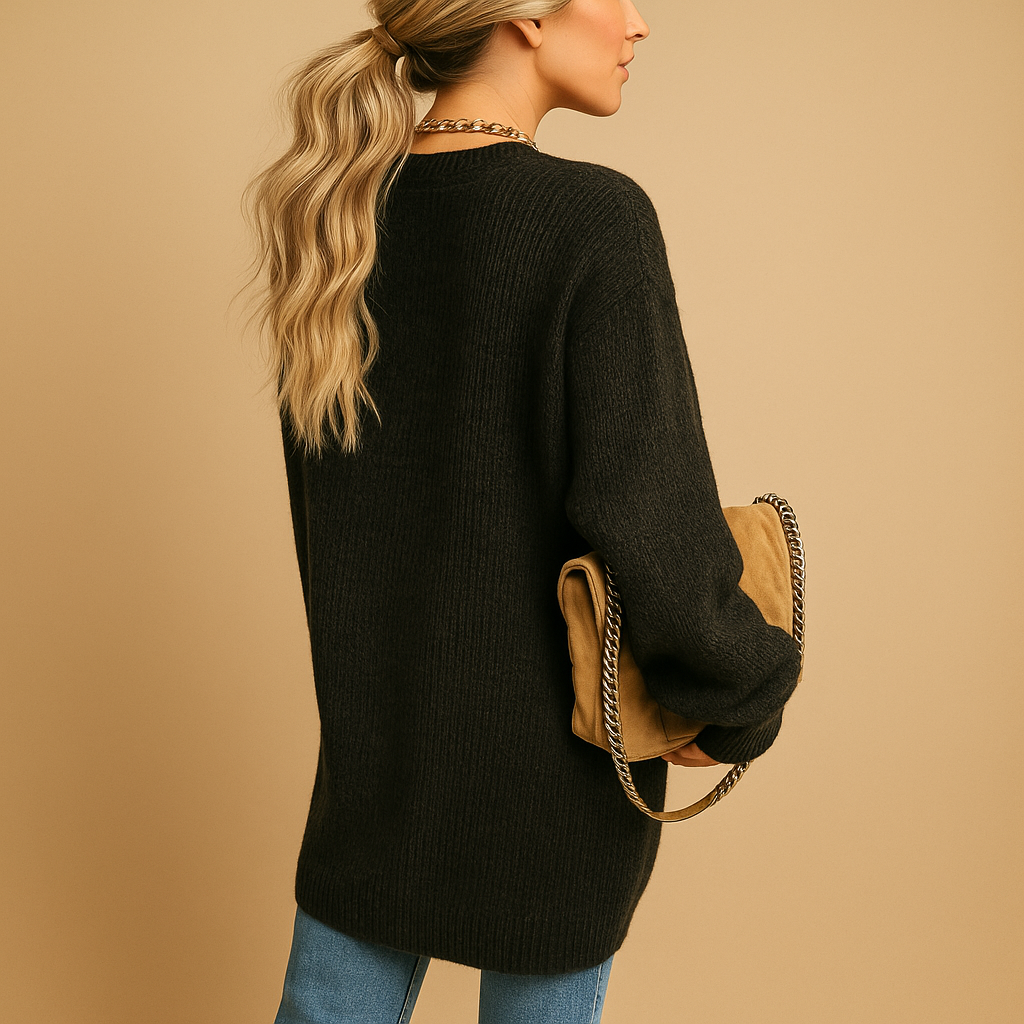 Klassiek gebreid damesvest met open voorkant en lange mouwen. Zacht, warm en perfect voor winter en tussenseizoenen in meerdere kleuren.