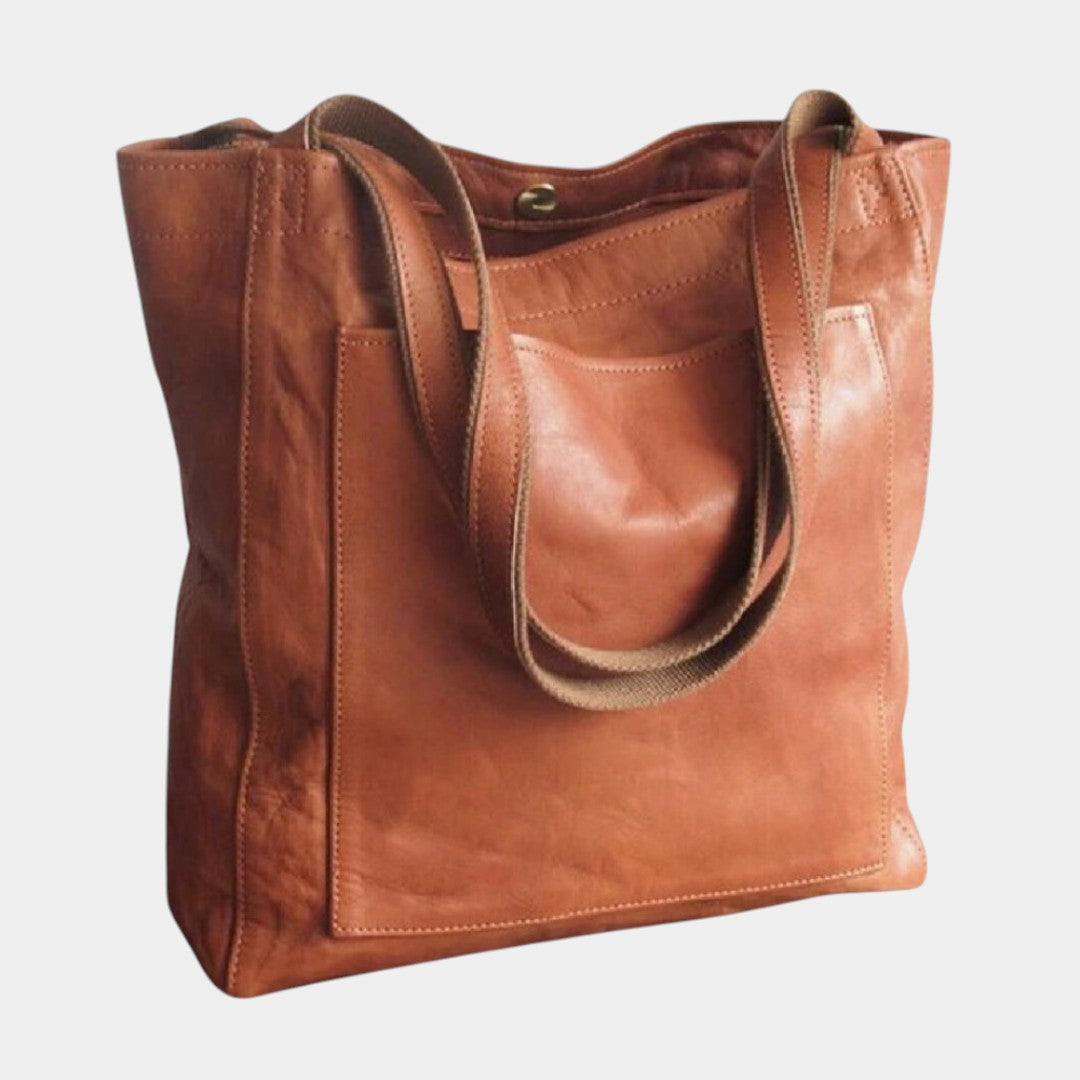 Handgemaakte schoudertas van kunstleer voor dames, met elegant design en ruime opbergruimte – ideaal voor dagelijks gebruik of formele gelegenheden.