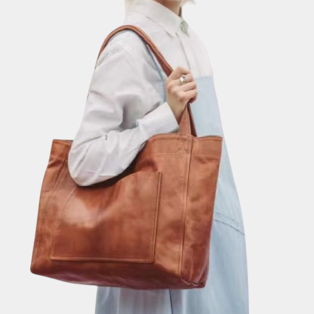 Handgemaakte schoudertas van kunstleer voor dames, met elegant design en ruime opbergruimte – ideaal voor dagelijks gebruik of formele gelegenheden.