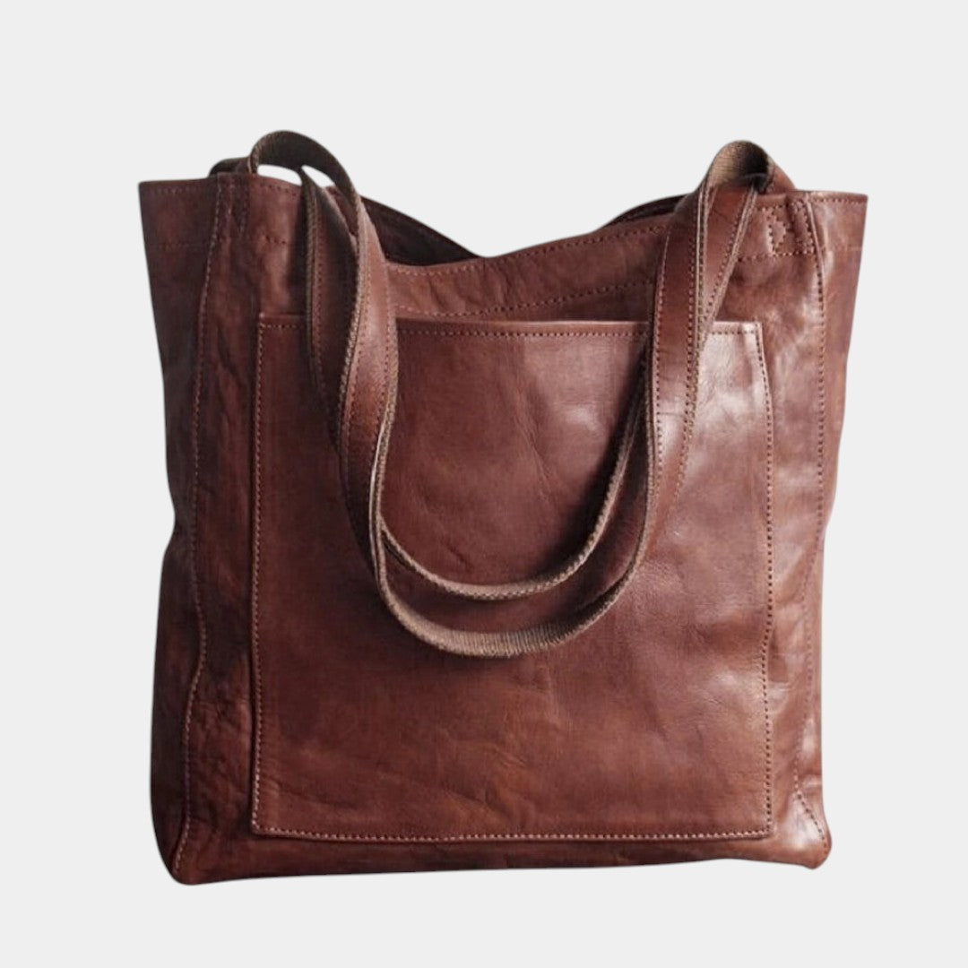 Handgemaakte schoudertas van kunstleer voor dames, met elegant design en ruime opbergruimte – ideaal voor dagelijks gebruik of formele gelegenheden.