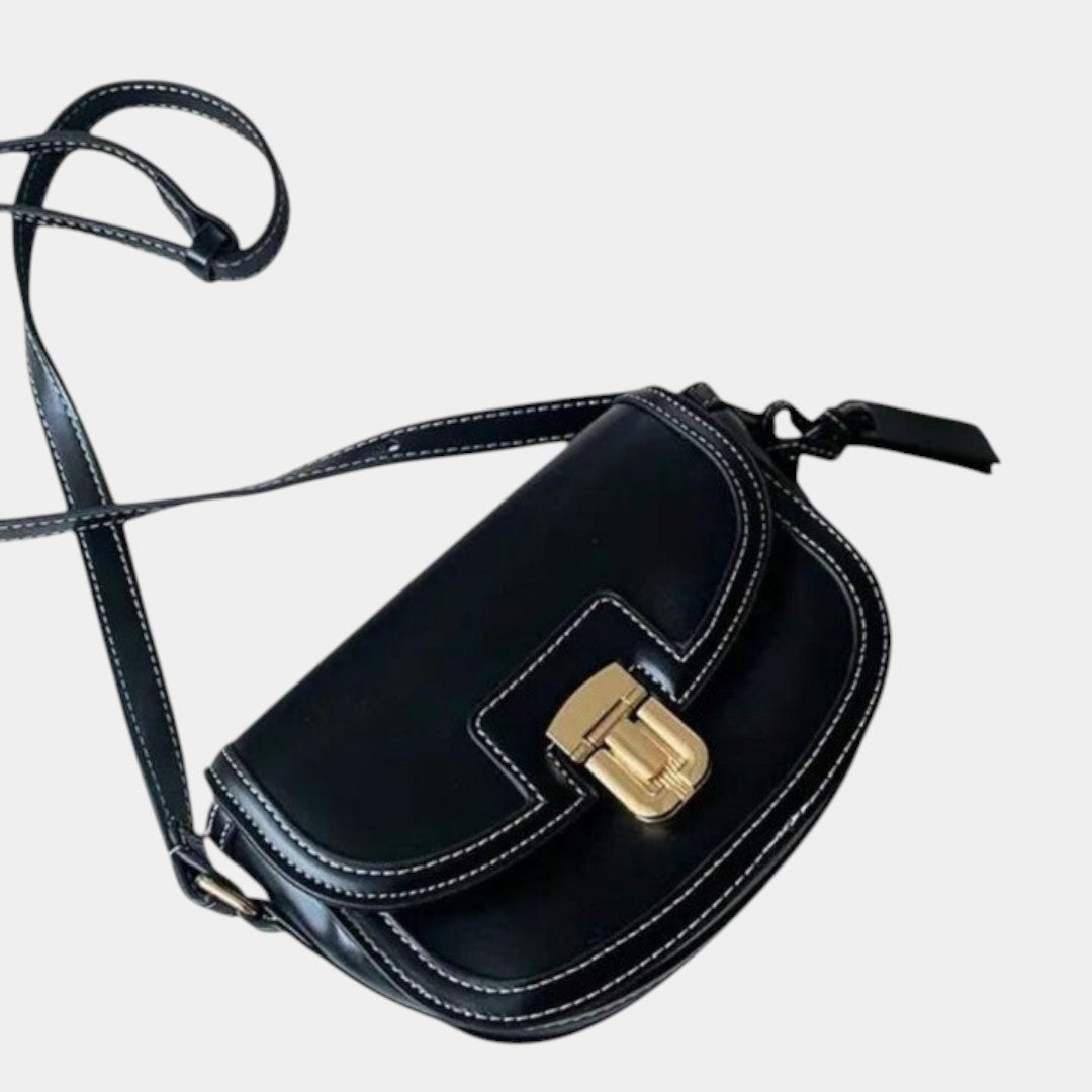 Crossbodytas met klep voor dames in tijdloos ontwerp, ideaal voor dagelijks gebruik en formele gelegenheden, verkrijgbaar in zwart en bruin.