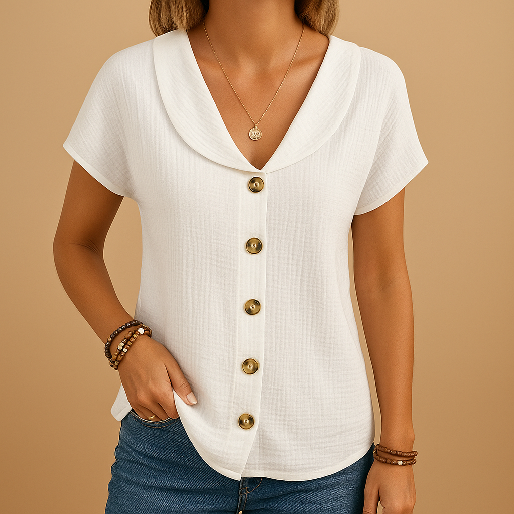 Elegante damesblouse met klassieke kraag, knoopsluiting en ademende pasvorm, ideaal voor werk of casual outfits.