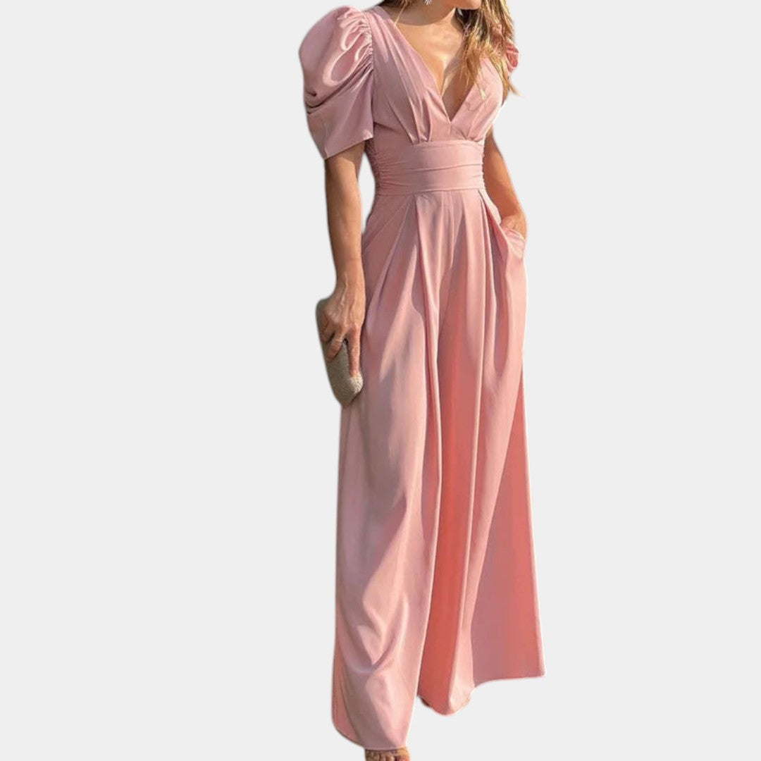 Lange dames jumpsuit met getailleerde pasvorm en elegant ontwerp, perfect voor gala’s, diners en formele evenementen. Beschikbaar in vijf stijlvolle kleuren.