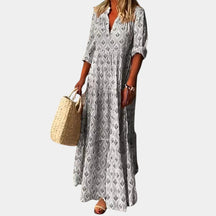 Knielange zomerjurk voor dames in lichtgewicht stof, perfect voor lente- en zomerdagen met een elegante, comfortabele pasvorm.