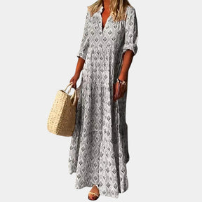 Knielange zomerjurk voor dames in lichtgewicht stof, perfect voor lente- en zomerdagen met een elegante, comfortabele pasvorm.