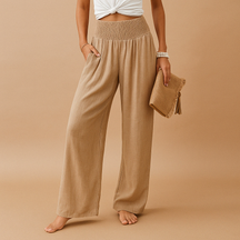 Linnen broek voor dames met elastische taille en rechte pijpen in verschillende kleuren – perfect voor zomerse en casual outfits.