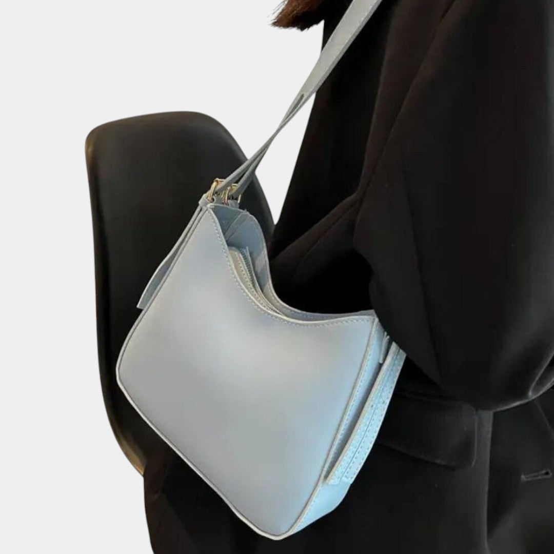 Minimalistische crossbodytas voor dames in stijlvolle kleuren, ideaal voor dagelijks gebruik, werk en speciale gelegenheden.