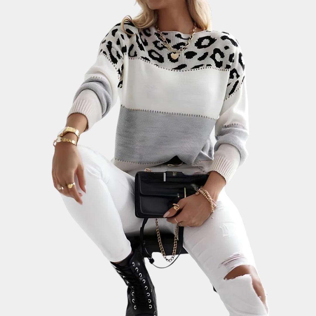 Oversized trui met luipaardprint voor dames in beige, zwart of grijs, ideaal voor herfst en winter, te combineren met jeans of rok.