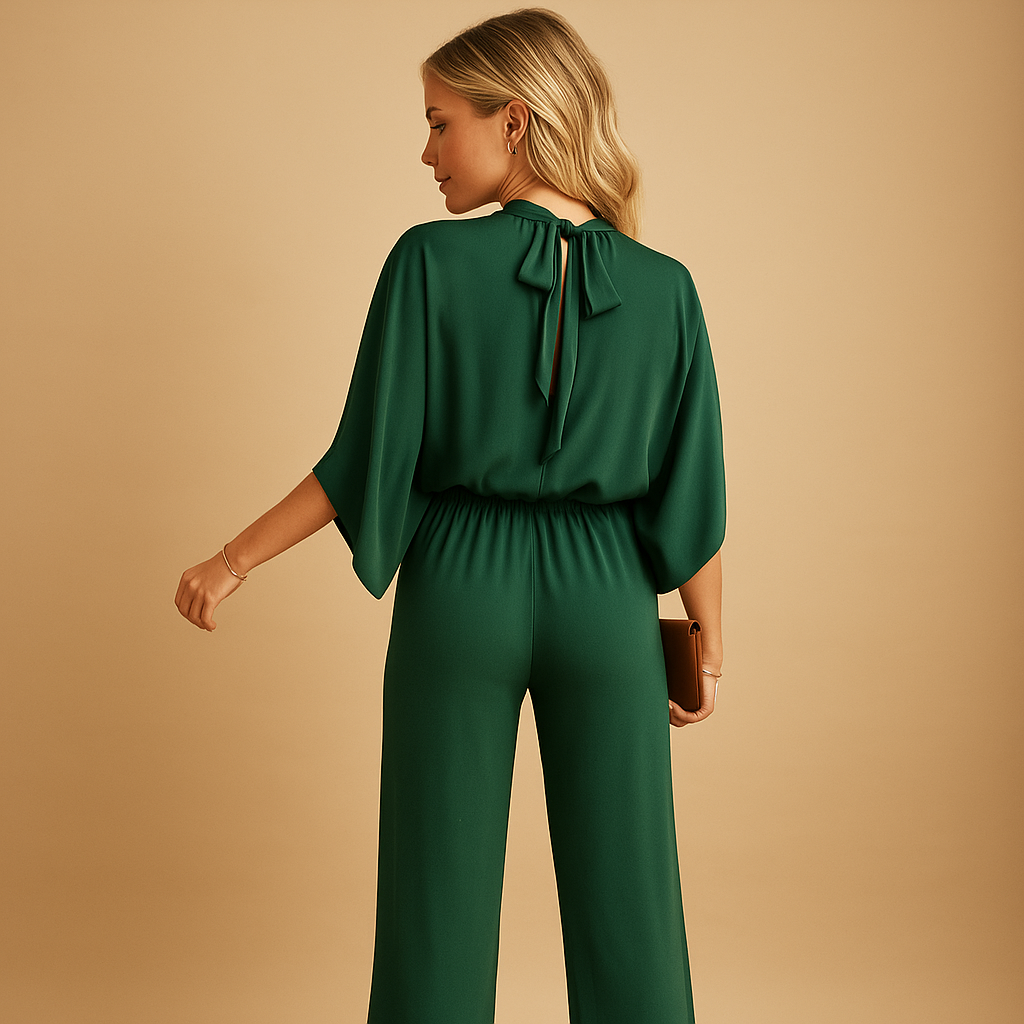 Stijlvolle dames jumpsuit met lange mouwen en wijde broekspijpen, perfect voor zowel formele gelegenheden als casual momenten.