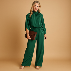 Stijlvolle dames jumpsuit met lange mouwen en wijde broekspijpen, perfect voor zowel formele gelegenheden als casual momenten.