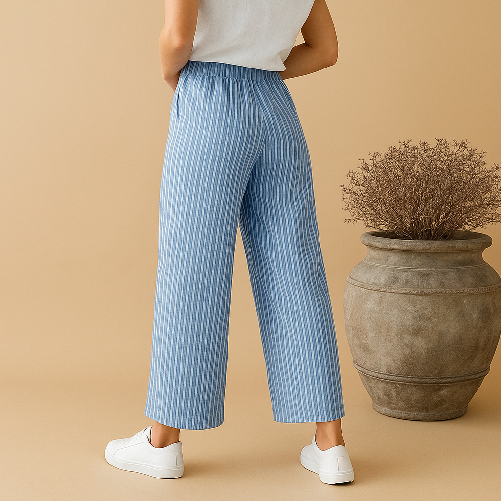 Zomerbroek voor dames met normale pasvorm, luchtig materiaal en elegante uitstraling, geschikt voor casual en chique zomerse outfits.
