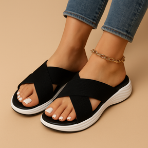 Platte dames sandalen met ademende materialen en dempende zool, perfect voor zomerse dagen en dagelijks comfort.