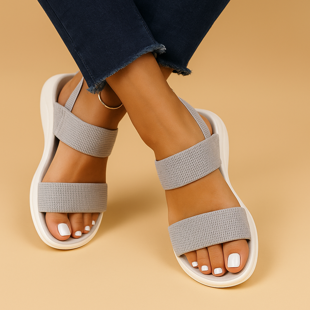 Platte dames sandalen met ademende materialen en dempende zool, perfect voor zomerse dagen en dagelijks comfort.