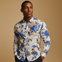 Heren bloemenoverhemd met moderne pasvorm en opvallende print in zwart, blauw of rood – perfect voor casual en semi-formele outfits.
