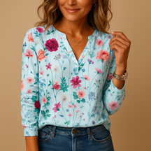 Dames blouse met bloemenprint, V-hals en lange mouwen in frisse kleuren, ideaal voor casual en chique zomerse outfits.