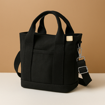 Canvas schoudertas voor dames met meerdere vakken, verstelbare schouderriem en compacte indeling, ideaal voor dagelijks gebruik.