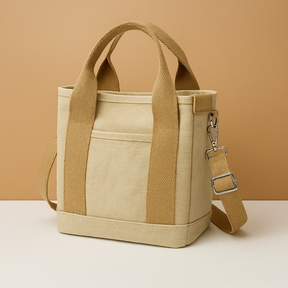 Canvas schoudertas voor dames met meerdere vakken, verstelbare schouderriem en compacte indeling, ideaal voor dagelijks gebruik.