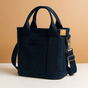 Canvas schoudertas voor dames met meerdere vakken, verstelbare schouderriem en compacte indeling, ideaal voor dagelijks gebruik.