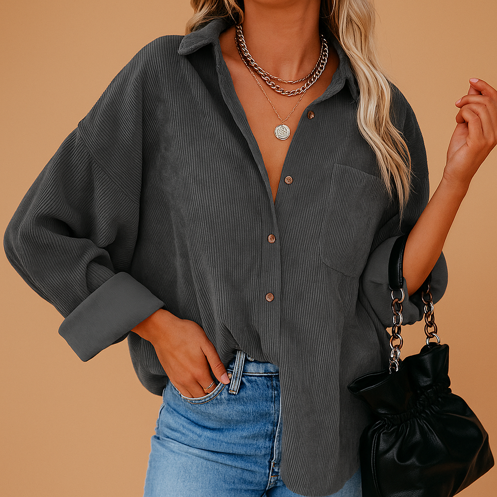 Corduroy gebreid jack voor dames met geribde accenten in aardse seizoenskleuren. Comfortabel, warm en stijlvol voor elk seizoen.