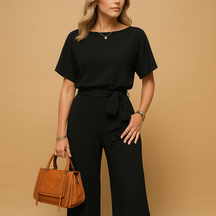 Chique dames jumpsuit in zwart, beige of groen met getailleerde pasvorm en losvallende mouwen, ideaal voor formele en stijlvolle gelegenheden.