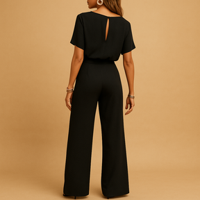 Chique dames jumpsuit in zwart, beige of groen met getailleerde pasvorm en losvallende mouwen, ideaal voor formele en stijlvolle gelegenheden.