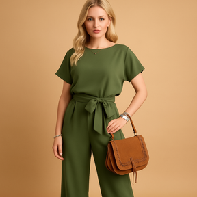 Chique dames jumpsuit in zwart, beige of groen met getailleerde pasvorm en losvallende mouwen, ideaal voor formele en stijlvolle gelegenheden.