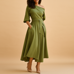 Elegante damesjurk met flatterende tailleband en zachte stof, perfect voor feestjes, bruiloften en casual gelegenheden