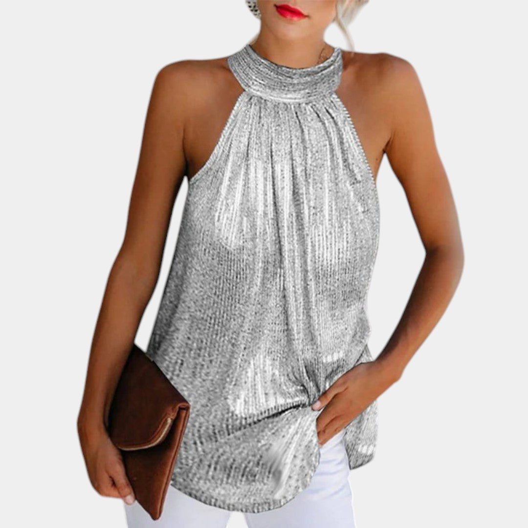 Dames top met kantdetails bij de hals en flatterende pasvorm, ideaal voor feestjes, diners en stijlvolle casual momenten