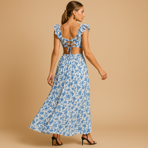 Gebloemde maxi-jurk voor dames met diepe V-hals, ruches, uitgesneden taille en hoge split, ideaal voor feestelijke zomermomenten.