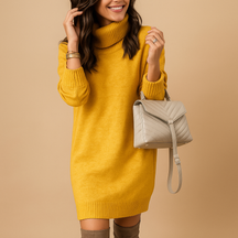 Gebreide midi-jurk voor dames met vrouwelijke pasvorm en elegante details, ideaal voor herfstwandelingen en kantoor.