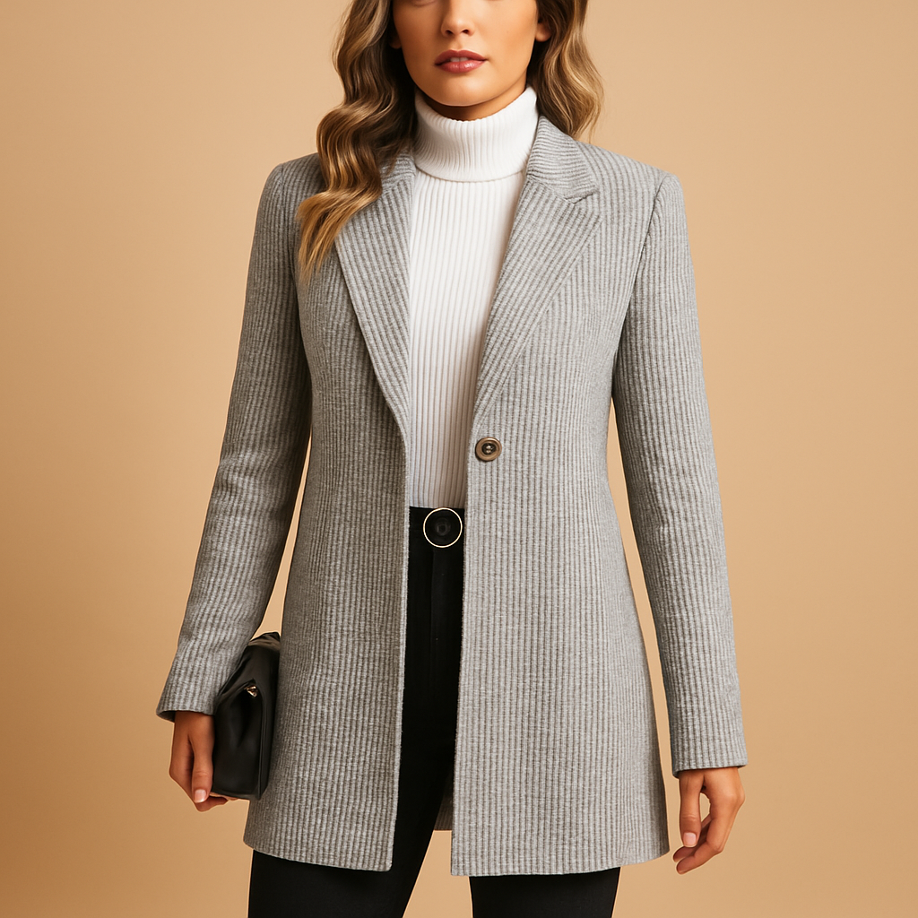 Elegante getailleerde damesblazer met lange mouwen, ideaal voor zakelijke bijeenkomsten of formele gelegenheden.