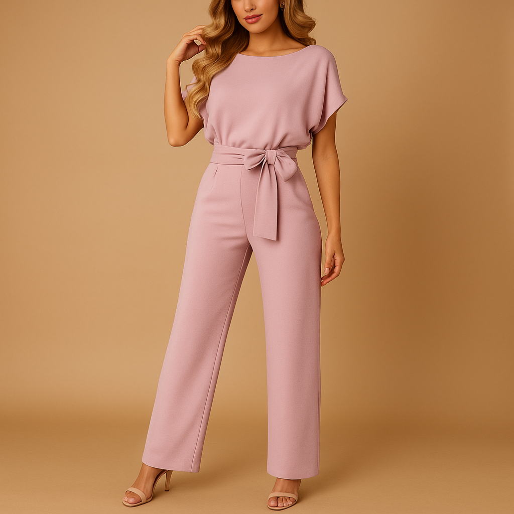 Dames jumpsuit met halternek, open rug en glitterstof – ideaal voor feestjes, gala’s en elegante gelegenheden.