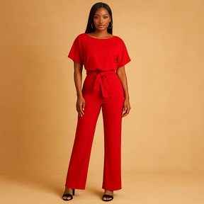 Dames jumpsuit met halternek, open rug en glitterstof – ideaal voor feestjes, gala’s en elegante gelegenheden.