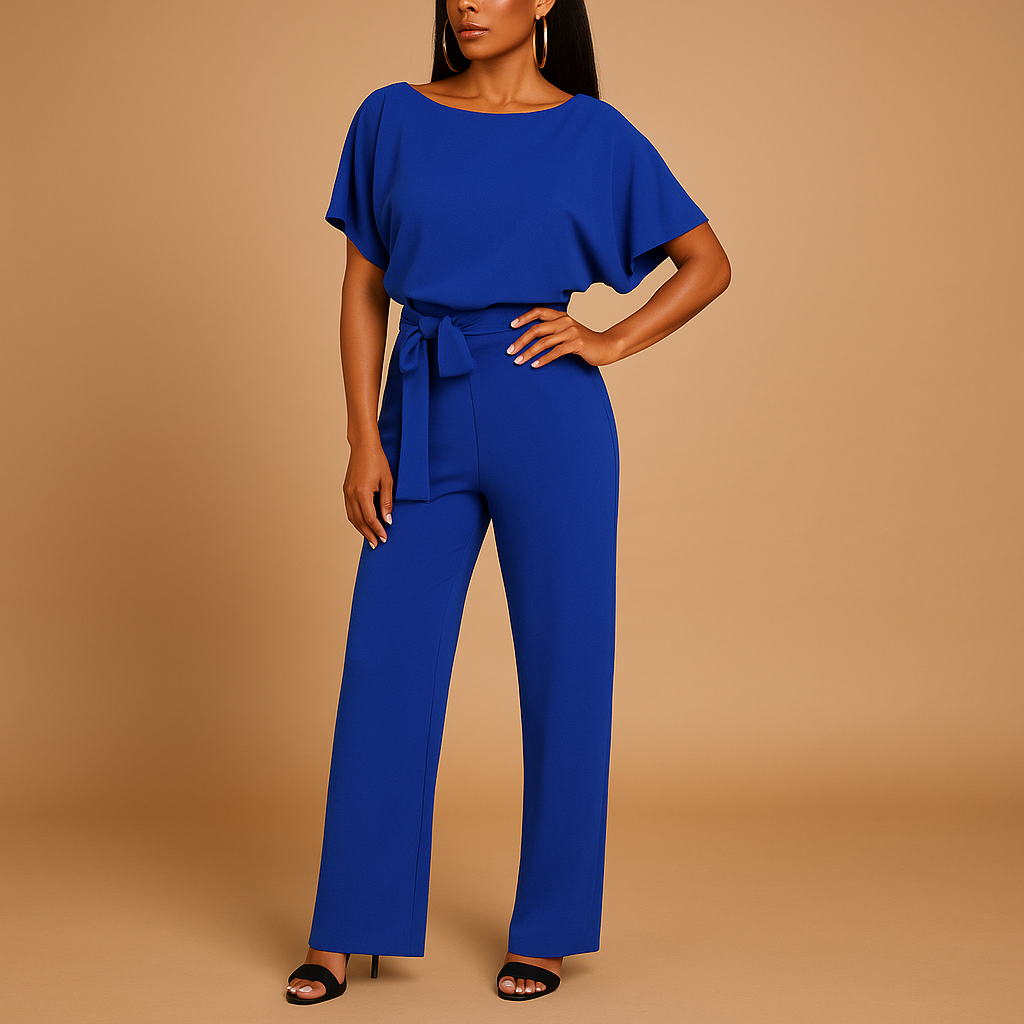 Dames jumpsuit met halternek, open rug en glitterstof – ideaal voor feestjes, gala’s en elegante gelegenheden.