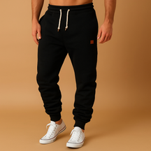 Comfortabele joggingbroek voor heren van katoenmix met verstelbare tailleband en zijzakken, perfect voor sport of ontspanning.