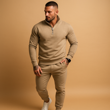 Joggingpak voor heren met halve rits trui en joggingbroek, beschikbaar in zwart, grijs, wit en khaki – ideaal voor thuis of onderweg.