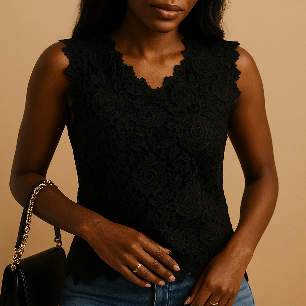 Dames blouse met ronde hals van luchtige stof en kanten details, ideaal voor zowel werk als casual gelegenheden. Beschikbaar in meerdere kleuren.