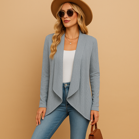 Lange gebreide cardigan voor dames in zachte stof en effen kleuren, ideaal voor layering in lente en herfst met een elegante en casual look.