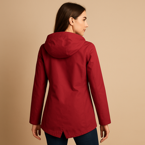 Lange waterafstotende regenjas met capuchon voor dames, ademend materiaal, ideaal voor dagelijks gebruik in weer en wind.