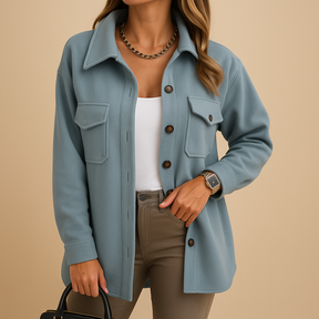 Lange winterjas voor dames met getailleerd silhouet en elegante lange snit. Ideaal voor formele gelegenheden en stijlvolle dagelijkse outfits.