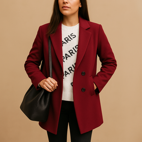 Lange winterjas voor dames met elegant enkelrijig design en warme pasvorm. Beschikbaar in grijs, blauw en camel, ideaal voor koude dagen.