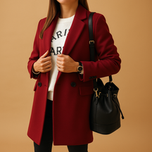 Lange winterjas voor dames met elegant enkelrijig design en warme pasvorm. Beschikbaar in grijs, blauw en camel, ideaal voor koude dagen.