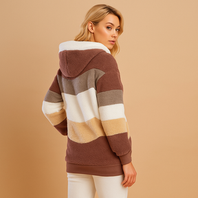 Lange zachte winterjas voor dames met pluche textuur en relaxte pasvorm. Ideaal voor dagelijks gebruik en warme bescherming tijdens koude seizoenen.