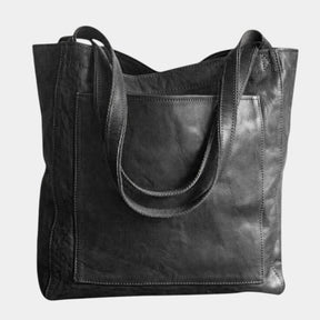 Handgemaakte schoudertas van kunstleer voor dames, met elegant design en ruime opbergruimte – ideaal voor dagelijks gebruik of formele gelegenheden.