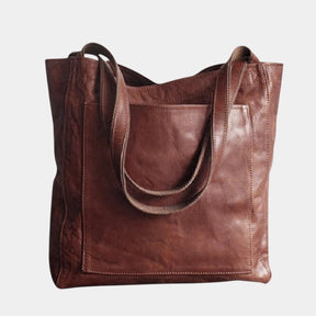 Handgemaakte schoudertas van kunstleer voor dames, met elegant design en ruime opbergruimte – ideaal voor dagelijks gebruik of formele gelegenheden.